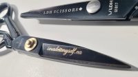Two pairs of midnight black LDH scissors. One pair shows engraved letter with imadeitmyself.ca